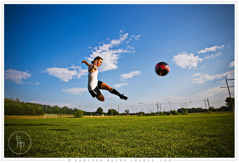 Kameron Bayne Images - Taylor Flying through the Air with Soccer Kick for Senior Pictures
