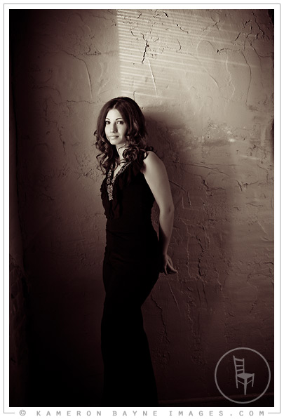 Kameron Bayne Images - Francine Portrait - standing against window lit wall