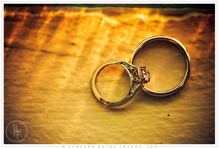 Kameron Bayne Images - Wedding Rings bathed in Stained Glass Window Light