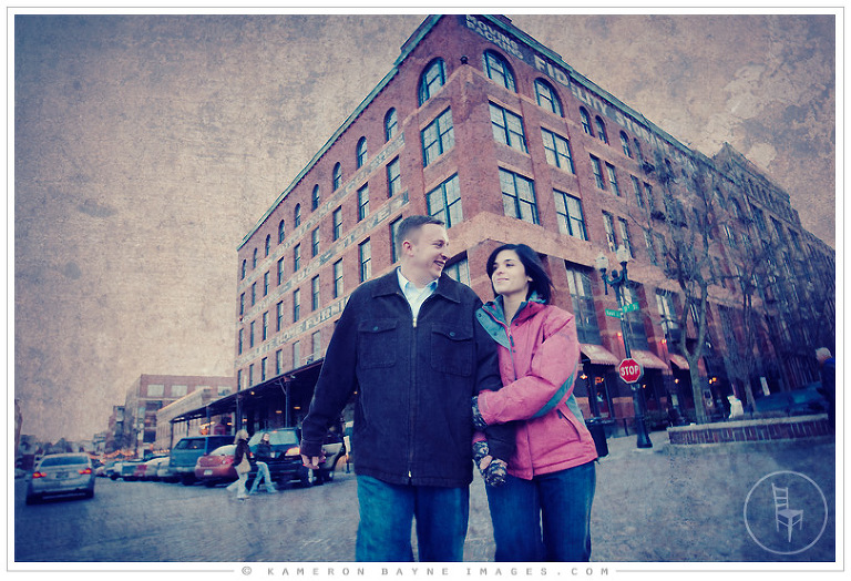 Kameron Bayne Images - Engaged Couple walking in Old Market, downton Omaha
