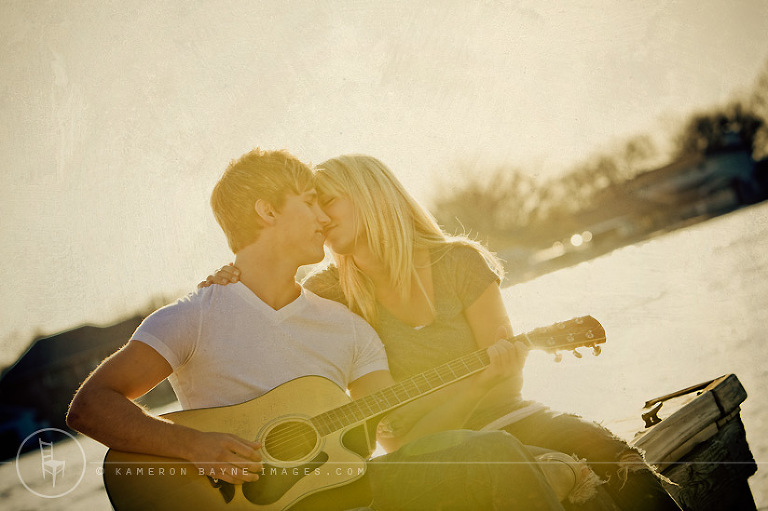 engagement couple, natural, candid kiss by the lake