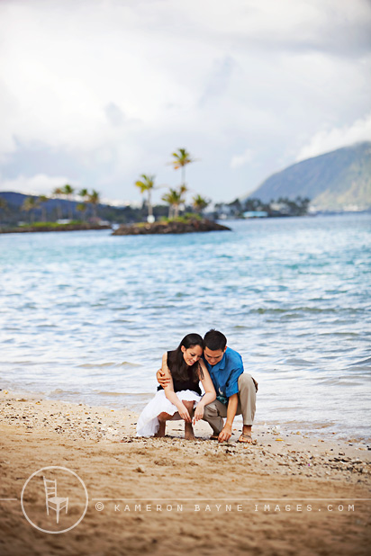 Kameron Bayne Images - Couple Collecting Sea Shells Together Kameron Bayne Images - Couple Collecting Sea Shells Together