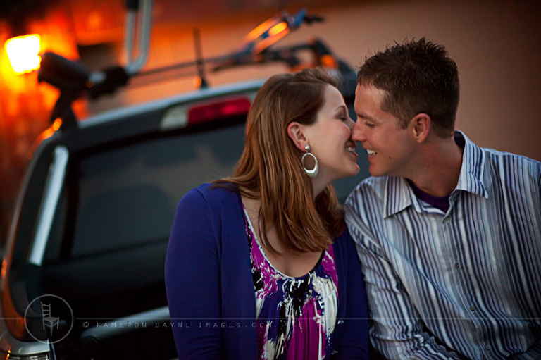 Engagement Kiss on the back of his Truck