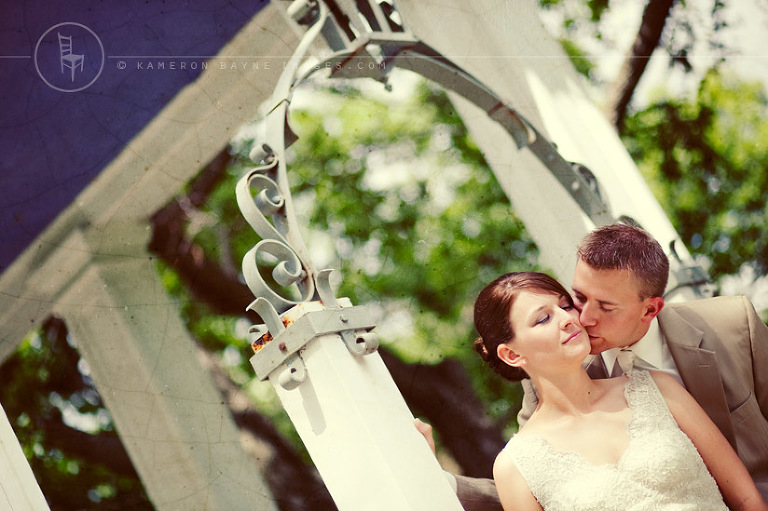 Kameron Bayne Images - Wedding Couple Kiss Under the Archway