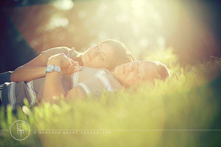 Kameron Bayne Images - Engagement Couple resting in the field