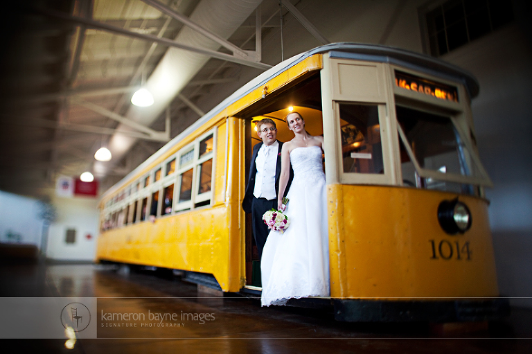 tilt shift wedding portrait on old train