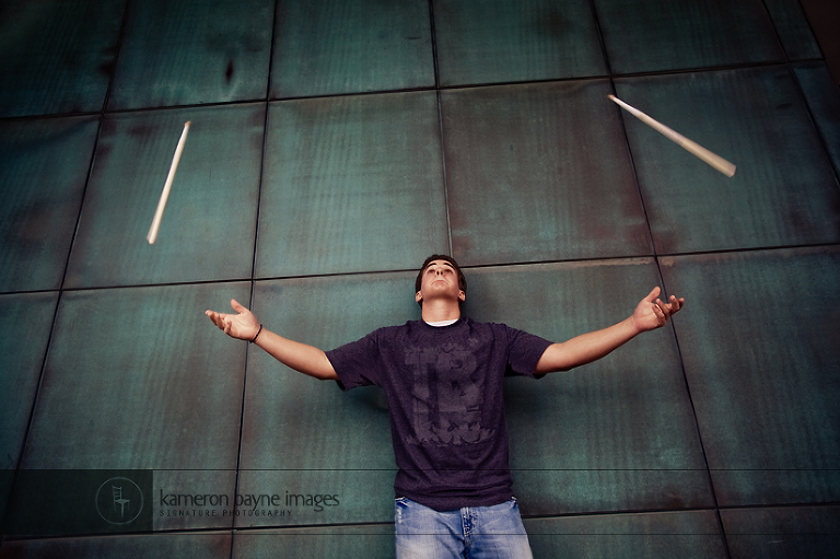 Kameron Bayne Images - Elkhorn Senior Josh - Flying Drum Sticks